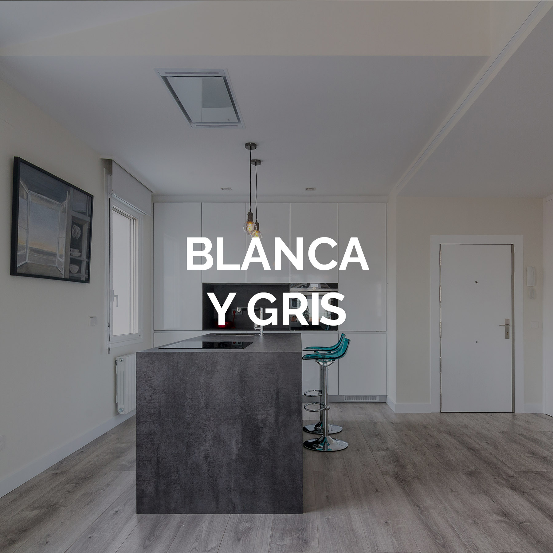 cocina con isla blanca y gris