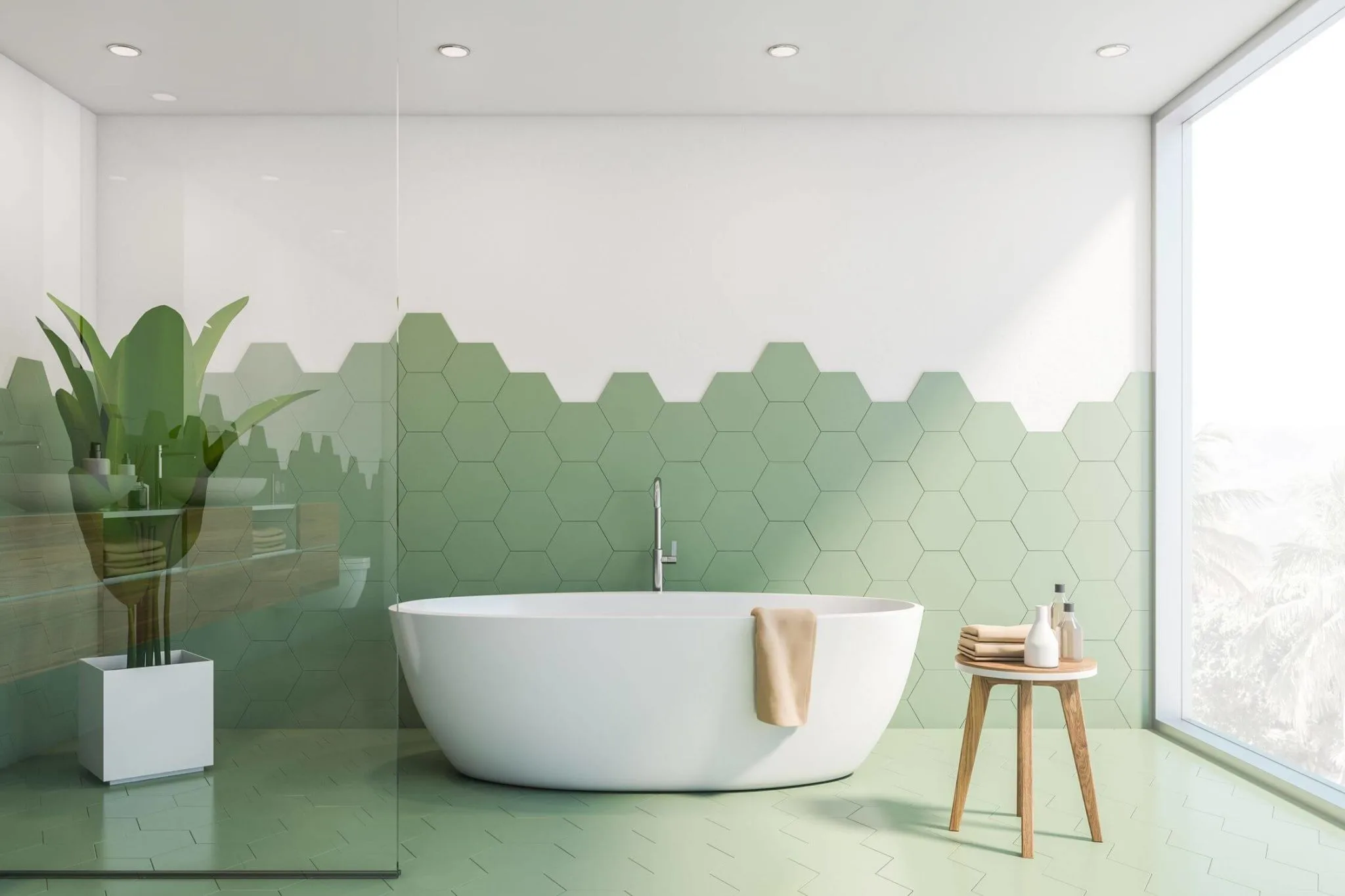Baño moderno en Madrid con bañera exenta y alicatado con mosaico