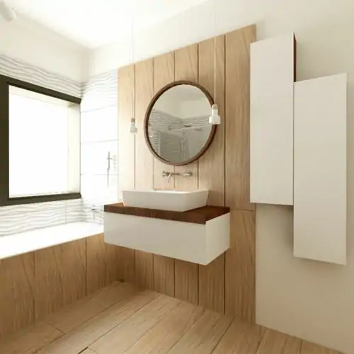 cuarto de baño con mobiliario a medida Baño minimalista con mobiliario suspendido blanco, panelado en madera natural y espejo circular enmarcado.