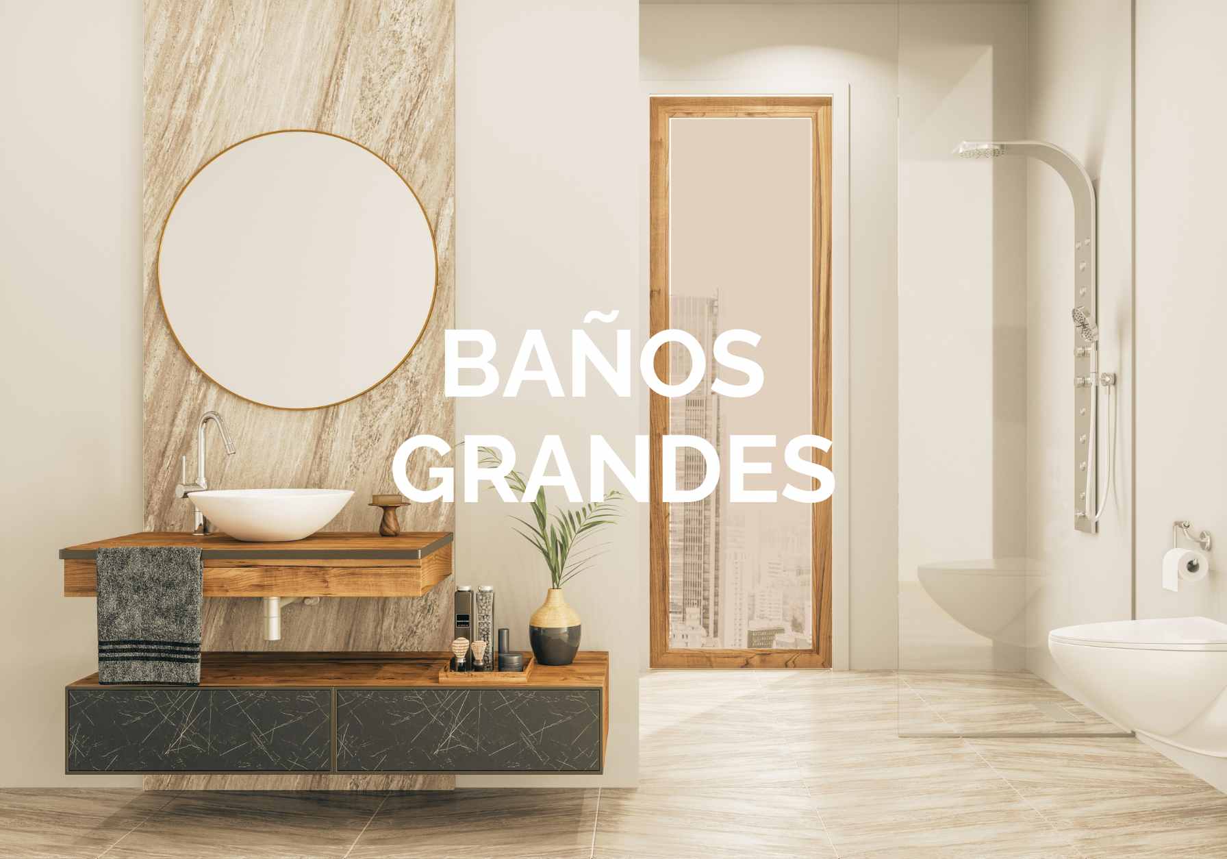 Baño amplio y moderno con mueble de madera, lavabo sobre encimera, espejo redondo y zona de ducha acristalada, con el texto “BAÑOS GRANDES” superpuesto.